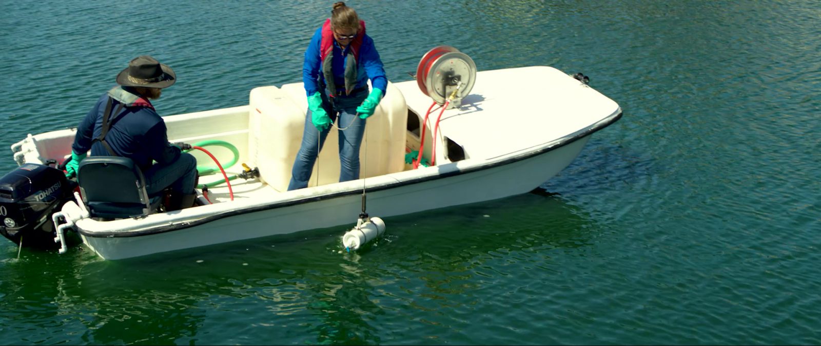 Hero image - water quality testing - data assessments - in house lab - colleagues on the job