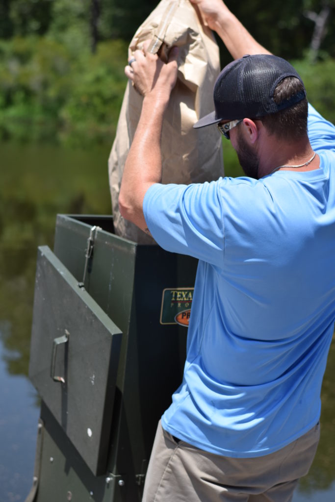 private-pond-tyler-tx-fish-feeder-supplemental feeding - on the job