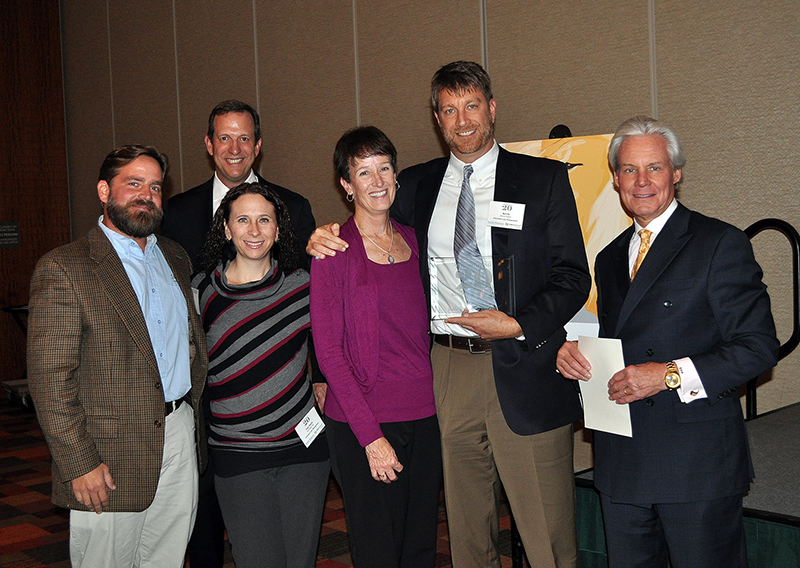SLM_Team_AcceptingAward_Roaring_20_2014_2_c