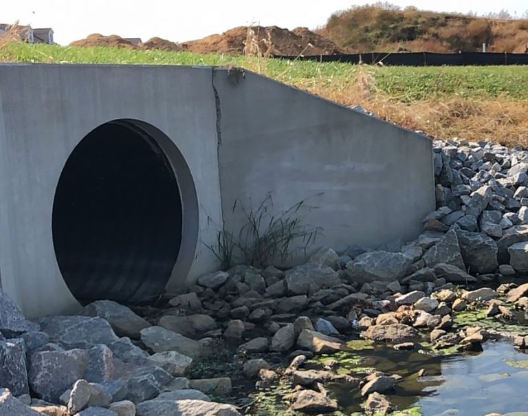 stormwater inspection lake and pond management - stormwater drain - rock wall - regulatory permitting