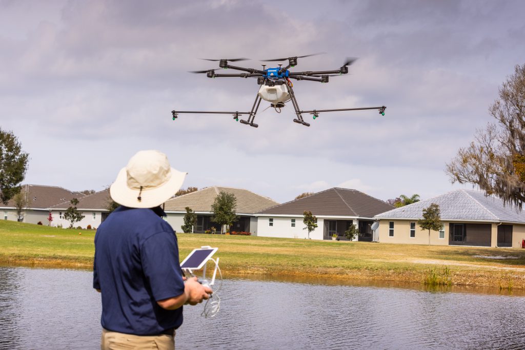 SOL_VDCI_drone-aerial-application-lake-and-pond-management-wetlands-algae-and-aquatic-weed-control-team-colleague-on-the-job