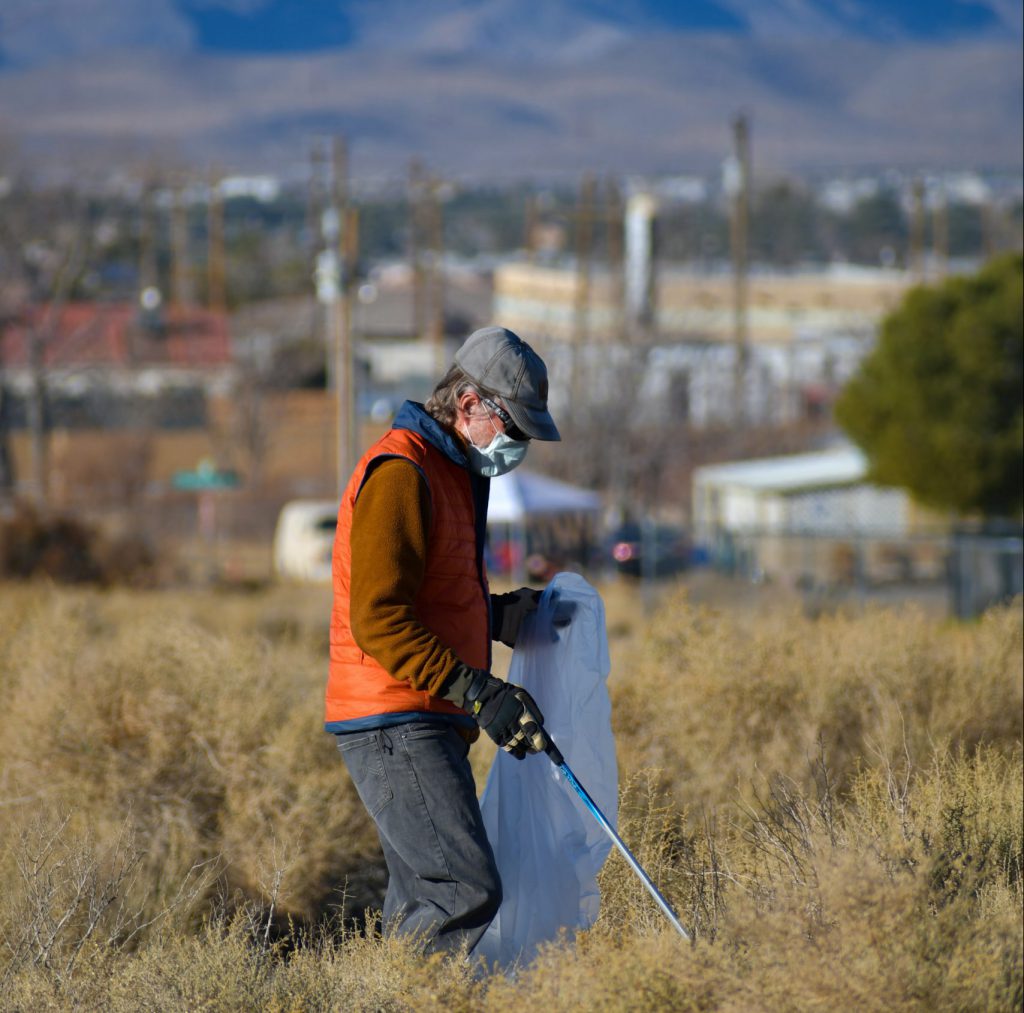 picking up trash earth day community involvement