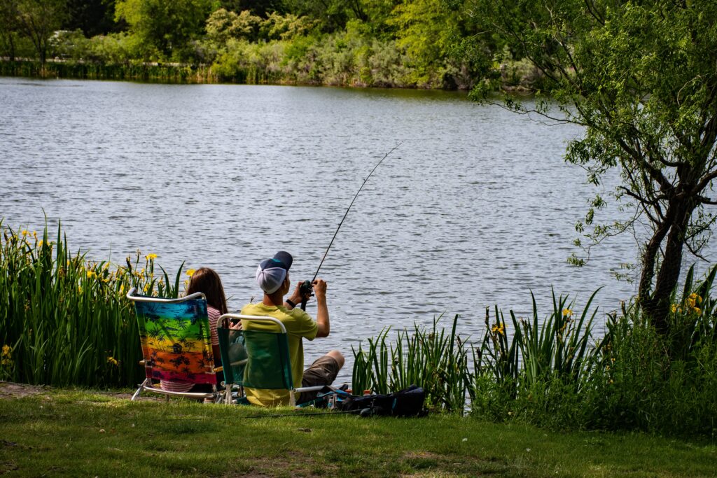 people-fishing-by-lake-pond
