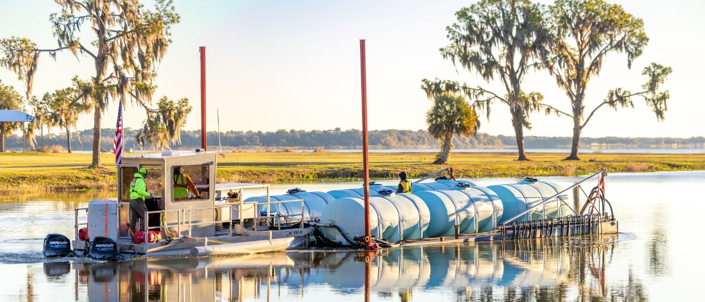 alum barge heading out to apply alum treatment to Lake Yale, FL