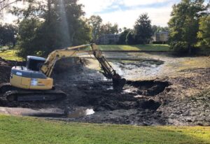 Dredging a community pond 