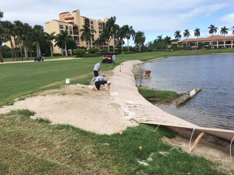 men-installing-erosion-repair-system-on-lake-shoreline