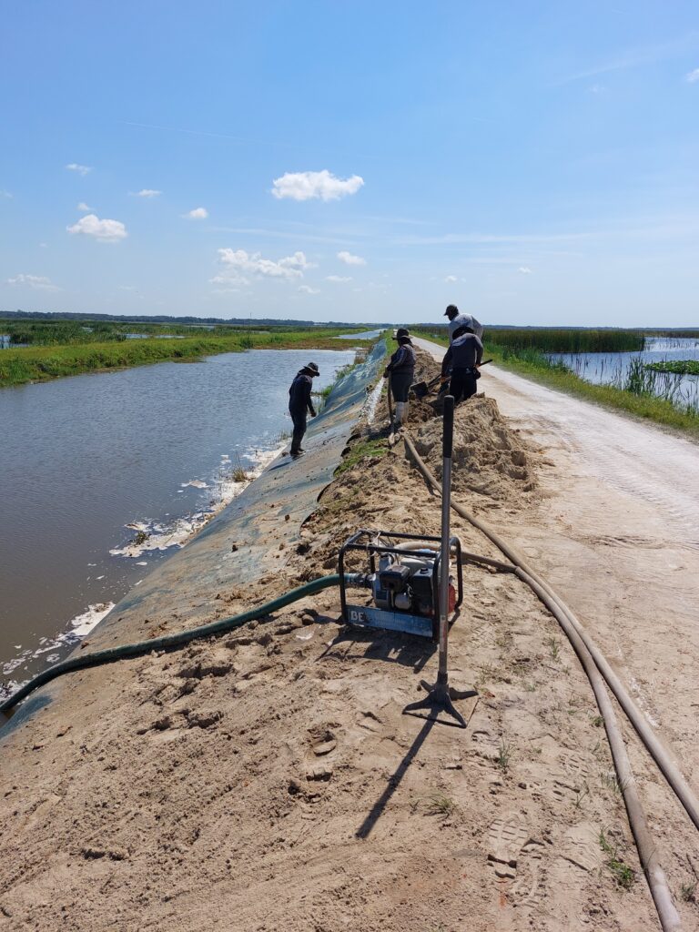 shoresox-install-men-standing-on-shoreline