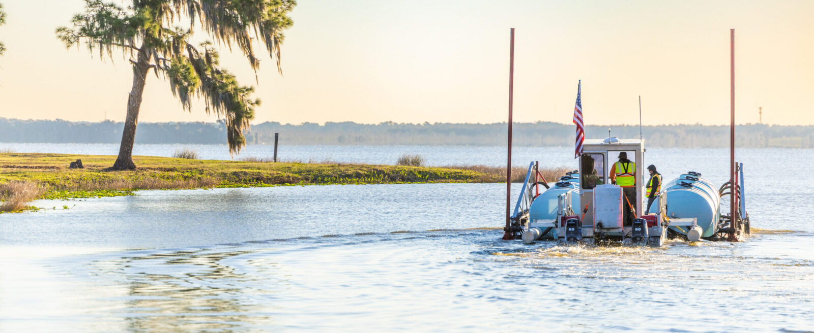 alum-application-barge-on-lake