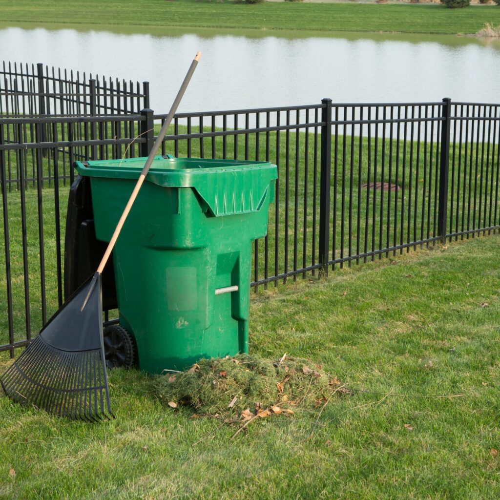 grass-clippings-trash-near-lake-pond
